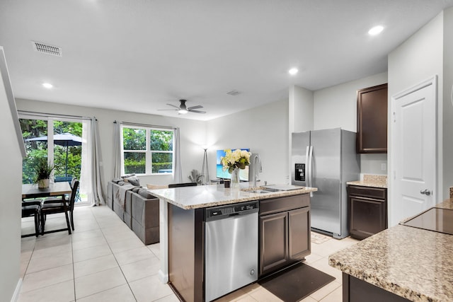 6340 Sailpointe Ln, West Palm Beach, FL 33413 - kitchen with appliances with stainless steel finishes, open floor plan, a ceiling fan, a sink, and dark brown cabinets