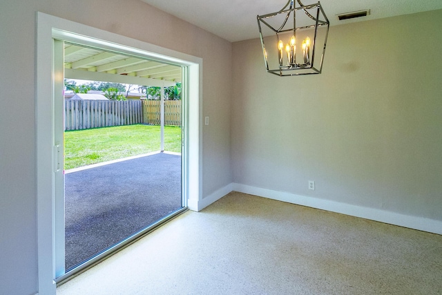 214 SW 3rd St, Boca Raton, FL 33432 - unfurnished dining area with a chandelier, baseboards, and speckle patterned floor