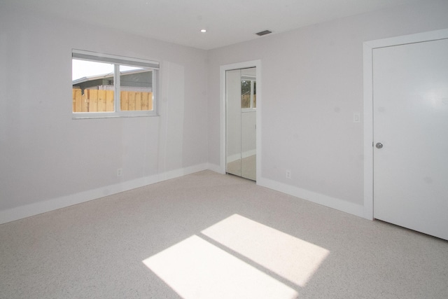 214 SW 3rd St, Boca Raton, FL 33432 - carpeted spare room with baseboards and recessed lighting