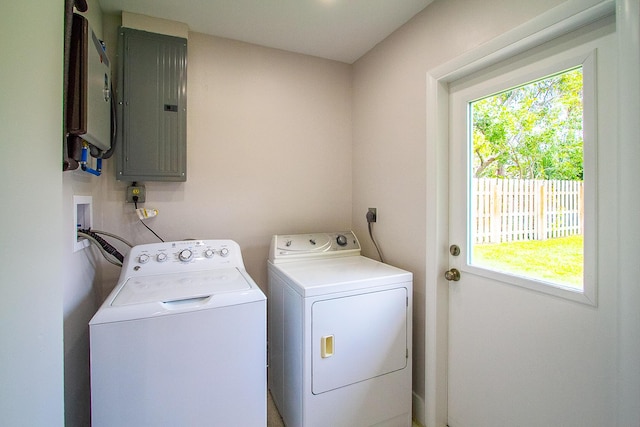 214 SW 3rd St, Boca Raton, FL 33432 - laundry area with electric panel and washer and clothes dryer