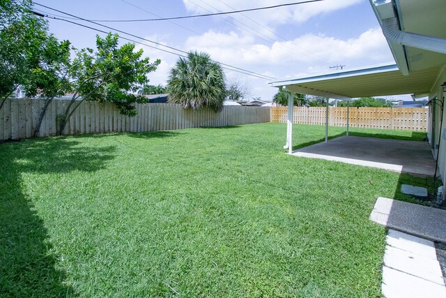 214 SW 3rd St, Boca Raton, FL 33432 - view of yard featuring a patio