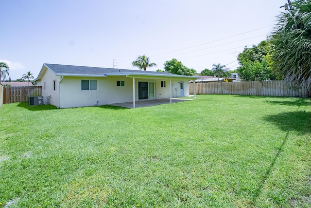 214 SW 3rd St, Boca Raton, FL 33432 - rear view of property featuring a patio area, cooling unit, and stucco siding