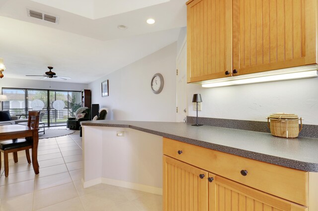 755 Saturn St Unit E 202, Jupiter, FL 33477 - kitchen with dark countertops, open floor plan, a ceiling fan, light tile patterned floors, and recessed lighting
