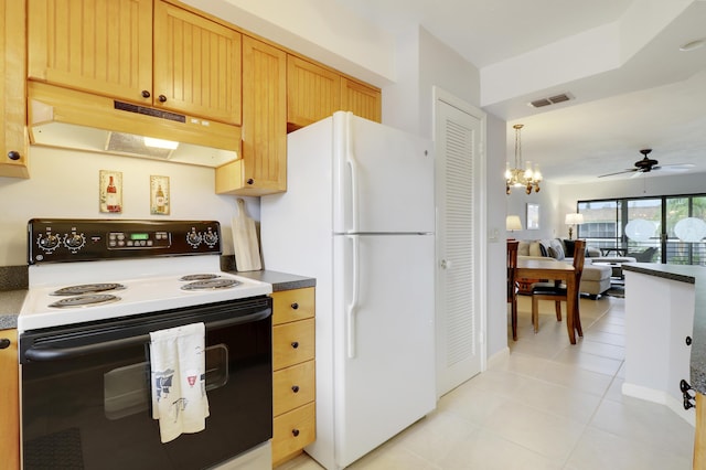 755 Saturn St Unit E 202, Jupiter, FL 33477 - kitchen with electric range, under cabinet range hood, freestanding refrigerator, a ceiling fan, and light tile patterned flooring