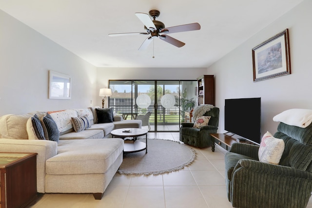 755 Saturn St Unit E 202, Jupiter, FL 33477 - living area with light tile patterned floors and a ceiling fan
