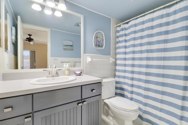 755 Saturn St Unit E 202, Jupiter, FL 33477 - full bathroom featuring toilet, vanity, a ceiling fan, and a shower with curtain