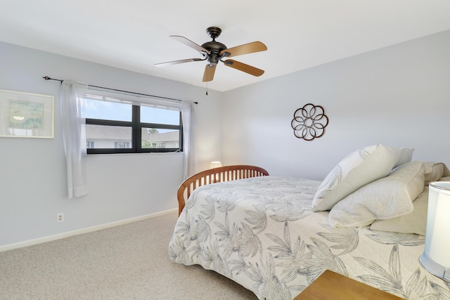 755 Saturn St Unit E 202, Jupiter, FL 33477 - bedroom featuring carpet floors, baseboards, and ceiling fan