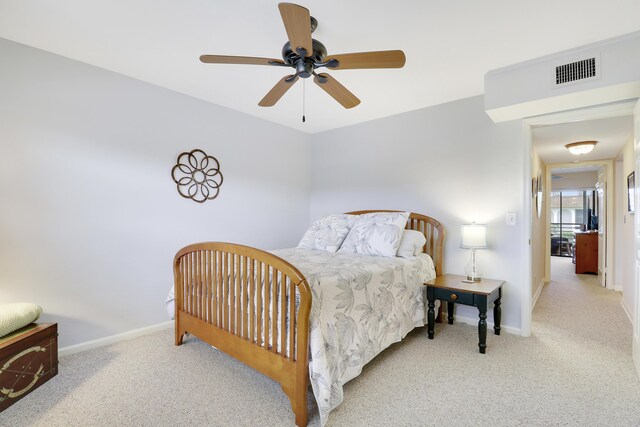 755 Saturn St Unit E 202, Jupiter, FL 33477 - carpeted bedroom featuring baseboards and ceiling fan