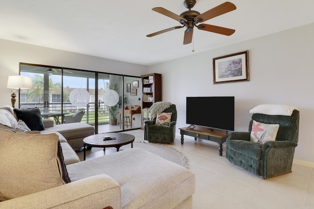 755 Saturn St Unit E 202, Jupiter, FL 33477 - living room featuring light tile patterned floors and ceiling fan