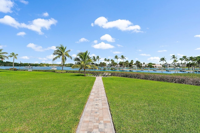 755 Saturn St Unit E 202, Jupiter, FL 33477 - view of community featuring a yard and a water view