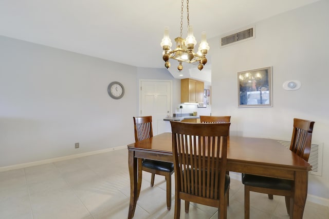 755 Saturn St Unit E 202, Jupiter, FL 33477 - dining area with a chandelier and baseboards