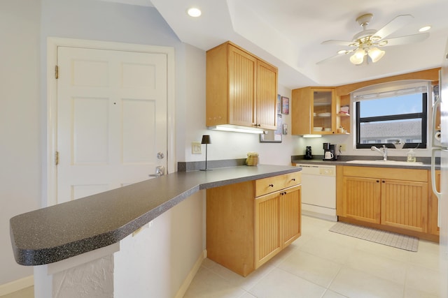 755 Saturn St Unit E 202, Jupiter, FL 33477 - kitchen with white dishwasher, a sink, dark countertops, ceiling fan, and glass insert cabinets