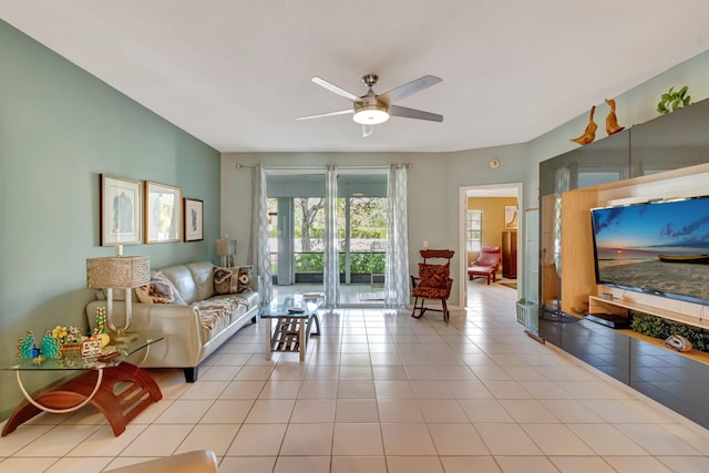 11650 Briarwood Cir Unit 2, Boynton Beach, FL 33437 - living room featuring ceiling fan and light tile patterned floors