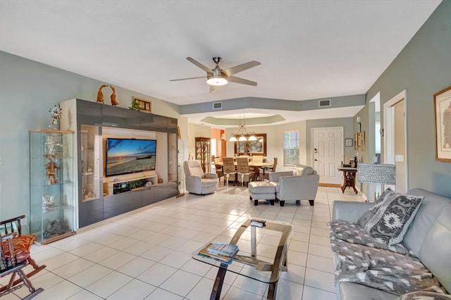 11650 Briarwood Cir Unit 2, Boynton Beach, FL 33437 - living room with ceiling fan, a chandelier, and light tile patterned flooring