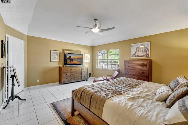 11650 Briarwood Cir Unit 2, Boynton Beach, FL 33437 - bedroom with light tile patterned floors, ceiling fan, and baseboards