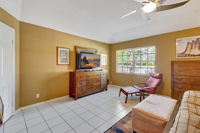 11650 Briarwood Cir Unit 2, Boynton Beach, FL 33437 - sitting room featuring a ceiling fan, light tile patterned floors, baseboards, and lofted ceiling