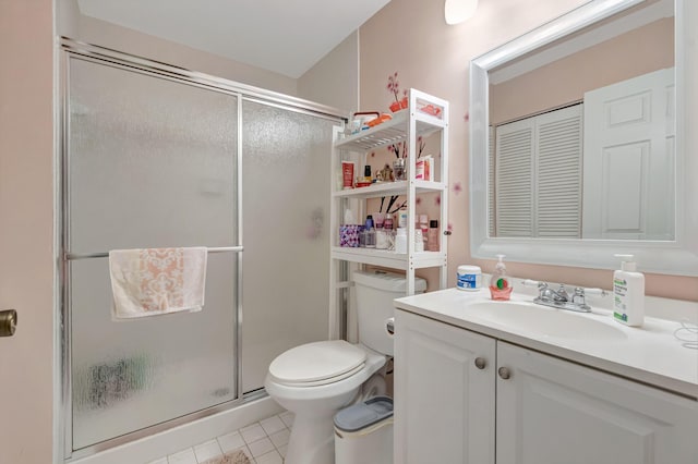 11650 Briarwood Cir Unit 2, Boynton Beach, FL 33437 - bathroom featuring a shower stall, vanity, toilet, and tile patterned flooring
