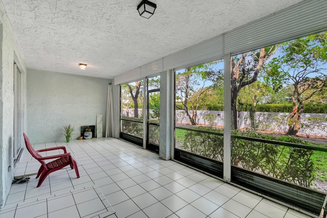 11650 Briarwood Cir Unit 2, Boynton Beach, FL 33437 - unfurnished sunroom with tile patterned floors