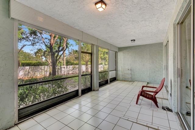 11650 Briarwood Cir Unit 2, Boynton Beach, FL 33437 - unfurnished sunroom with plenty of natural light