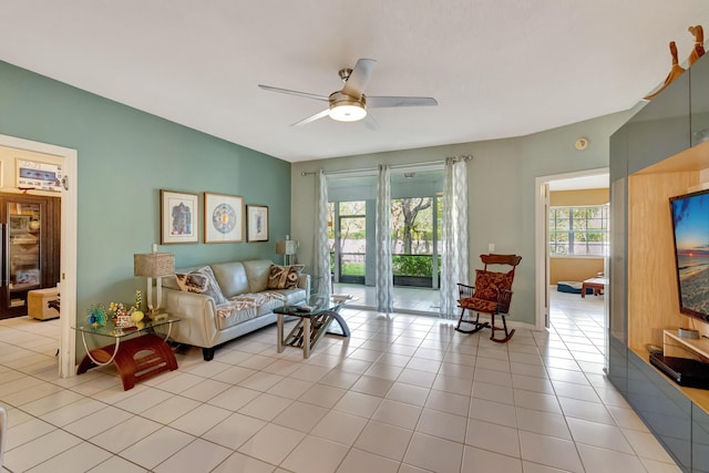 11650 Briarwood Cir Unit 2, Boynton Beach, FL 33437 - living area with a ceiling fan and light tile patterned floors