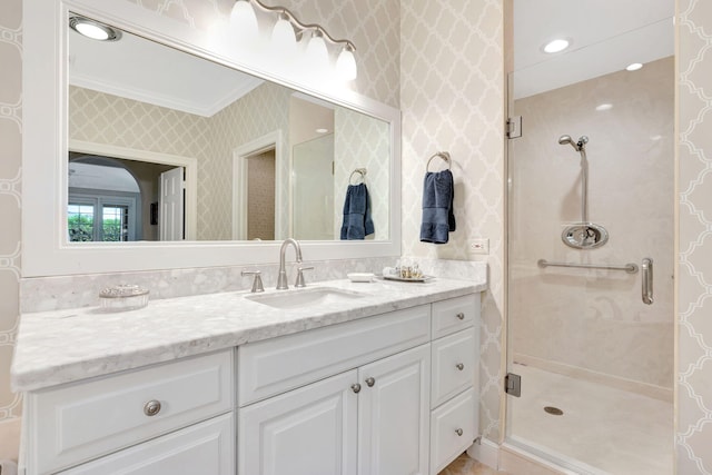 3321 Southern Cay Dr, Jupiter, FL 33477 - full bathroom with ornamental molding, vanity, a shower stall, and wallpapered walls