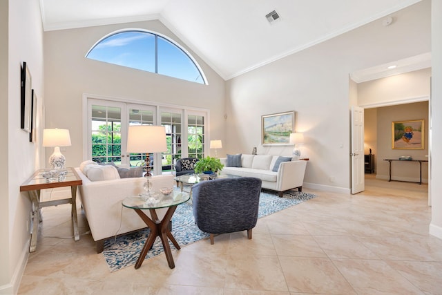 3321 Southern Cay Dr, Jupiter, FL 33477 - living room with crown molding, baseboards, high vaulted ceiling, and light tile patterned floors