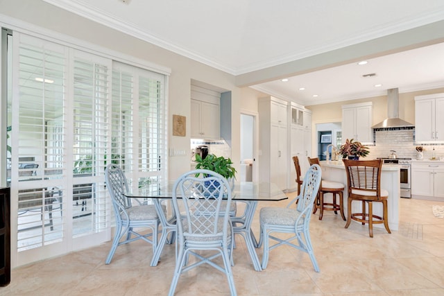 3321 Southern Cay Dr, Jupiter, FL 33477 - dining space featuring crown molding, recessed lighting, and light tile patterned flooring