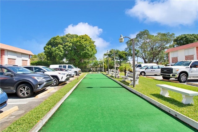 3550 NW 8th Ave Unit 604, Pompano Beach, FL 33064 - view of property's community featuring a game area and uncovered parking