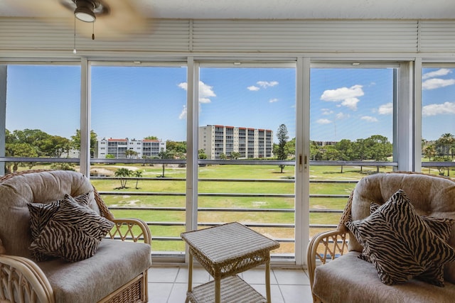3326 Arcara Way Unit 416, Lake Worth, FL 33467 - sunroom / solarium featuring view of golf course and ceiling fan