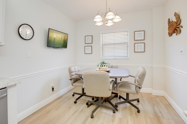 3326 Arcara Way Unit 416, Lake Worth, FL 33467 - dining room with light wood-type flooring, a chandelier, and baseboards