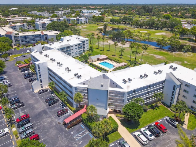 3326 Arcara Way Unit 416, Lake Worth, FL 33467 - aerial view of a golf course, a nearby body of water, and apartment complex