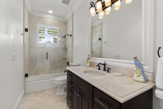 9212 Perth Rd, Lake Worth, FL 33467 - bathroom with crown molding, vanity, toilet, combined bath / shower with glass door, and tile patterned flooring