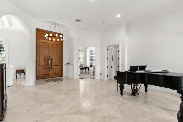 9212 Perth Rd, Lake Worth, FL 33467 - foyer entrance featuring arched walkways, ornamental molding, a chandelier, and recessed lighting