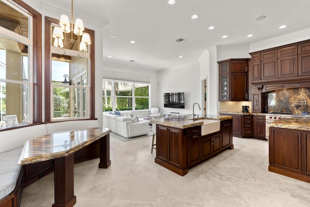 9212 Perth Rd, Lake Worth, FL 33467 - kitchen with a sink, tasteful backsplash, a chandelier, light stone countertops, and recessed lighting
