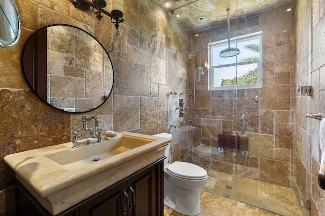 9212 Perth Rd, Lake Worth, FL 33467 - bathroom featuring a shower stall, vanity, toilet, and tile walls