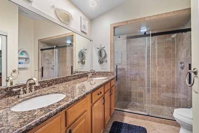 10560 Plainview Cir, Boca Raton, FL 33498 - full bathroom with toilet, a shower stall, tile patterned flooring, and double vanity