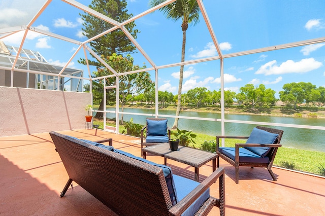 10560 Plainview Cir, Boca Raton, FL 33498 - view of patio with a water view, a lanai, and an outdoor hangout area
