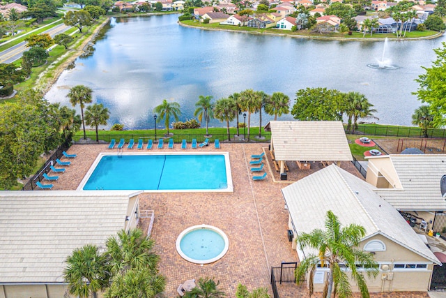 10560 Plainview Cir, Boca Raton, FL 33498 - community pool featuring a water view, a residential view, and a patio area