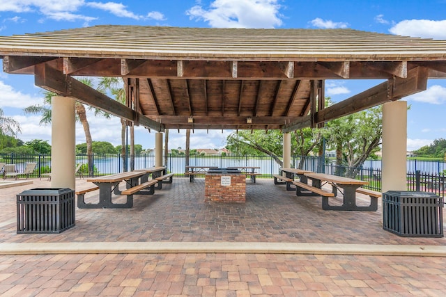 10560 Plainview Cir, Boca Raton, FL 33498 - surrounding community featuring a water view, a patio, and outdoor dining space