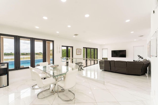 9475 Equus Cir, Boynton Beach, FL 33472 - dining room featuring recessed lighting, light marble finish floors, and french doors