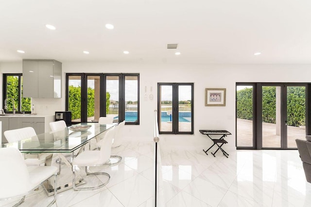 9475 Equus Cir, Boynton Beach, FL 33472 - dining space featuring french doors and recessed lighting