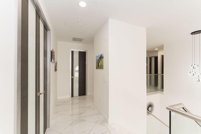 9475 Equus Cir, Boynton Beach, FL 33472 - corridor with light marble finish floors, recessed lighting, and baseboards
