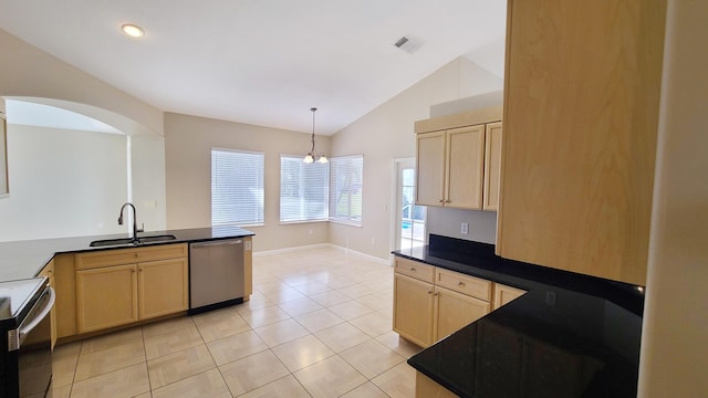 5170 NW Aljo Ct, Port Saint Lucie, FL 34986 - kitchen with dishwasher, a sink, range with electric cooktop, light brown cabinetry, and vaulted ceiling