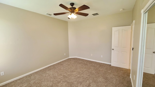 5170 NW Aljo Ct, Port Saint Lucie, FL 34986 - unfurnished room featuring carpet floors, a ceiling fan, a smoke detector, and baseboards
