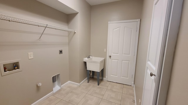5170 NW Aljo Ct, Port Saint Lucie, FL 34986 - laundry area with washer hookup, hookup for an electric dryer, and baseboards