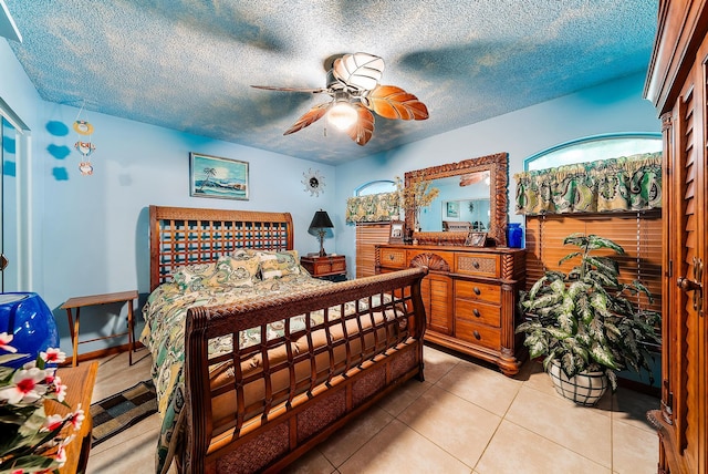 17862 123rd Ter N, Jupiter, FL 33478 - tiled bedroom with a textured ceiling and a ceiling fan