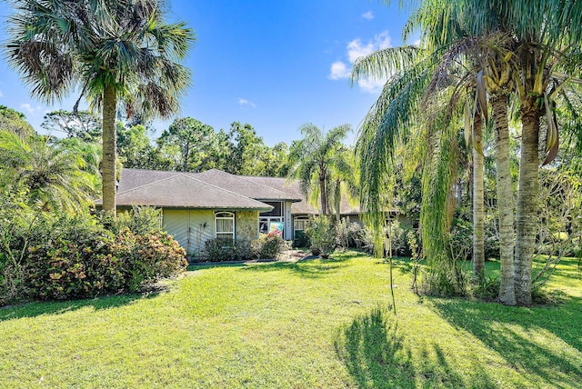 17862 123rd Ter N, Jupiter, FL 33478 - view of front facade featuring a front lawn