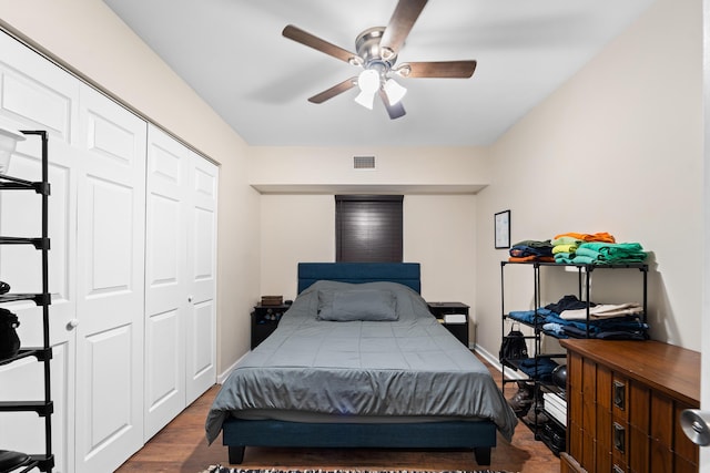 1214 Peak Rd, Lantana, FL 33462 - bedroom with wood finished floors, a closet, a ceiling fan, and baseboards