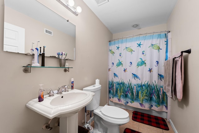 1214 Peak Rd, Lantana, FL 33462 - bathroom with toilet and tile patterned flooring