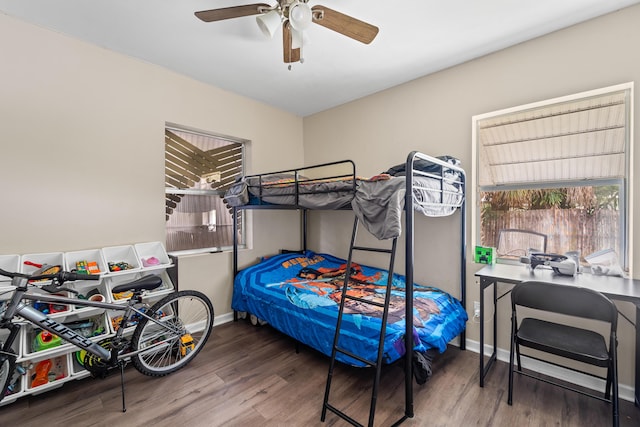 1214 Peak Rd, Lantana, FL 33462 - bedroom with wood finished floors, ceiling fan, and baseboards